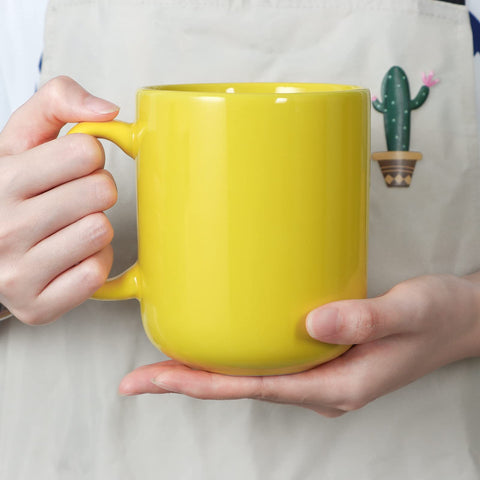Smilatte plain ceramic mug yellow ready for home or office use.