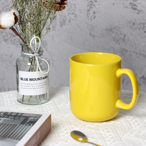 Smilatte yellow mug top view highlighting wide opening.
