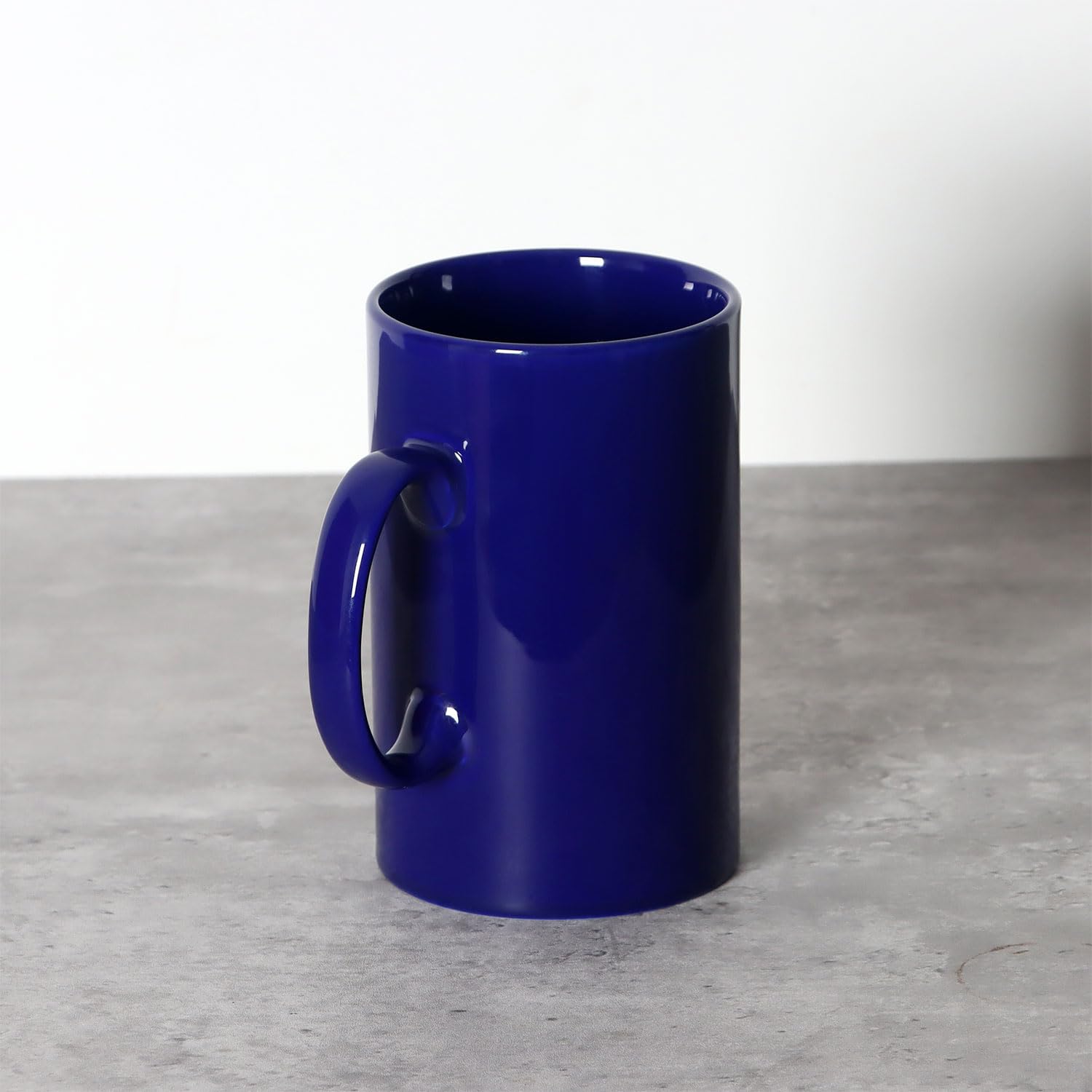 Smilatte 28oz mug on a desk, a bold office companion for long days