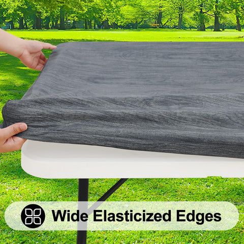 Smiry elastic fitted edge keeps the cover secure on 6ft tables outdoors.
