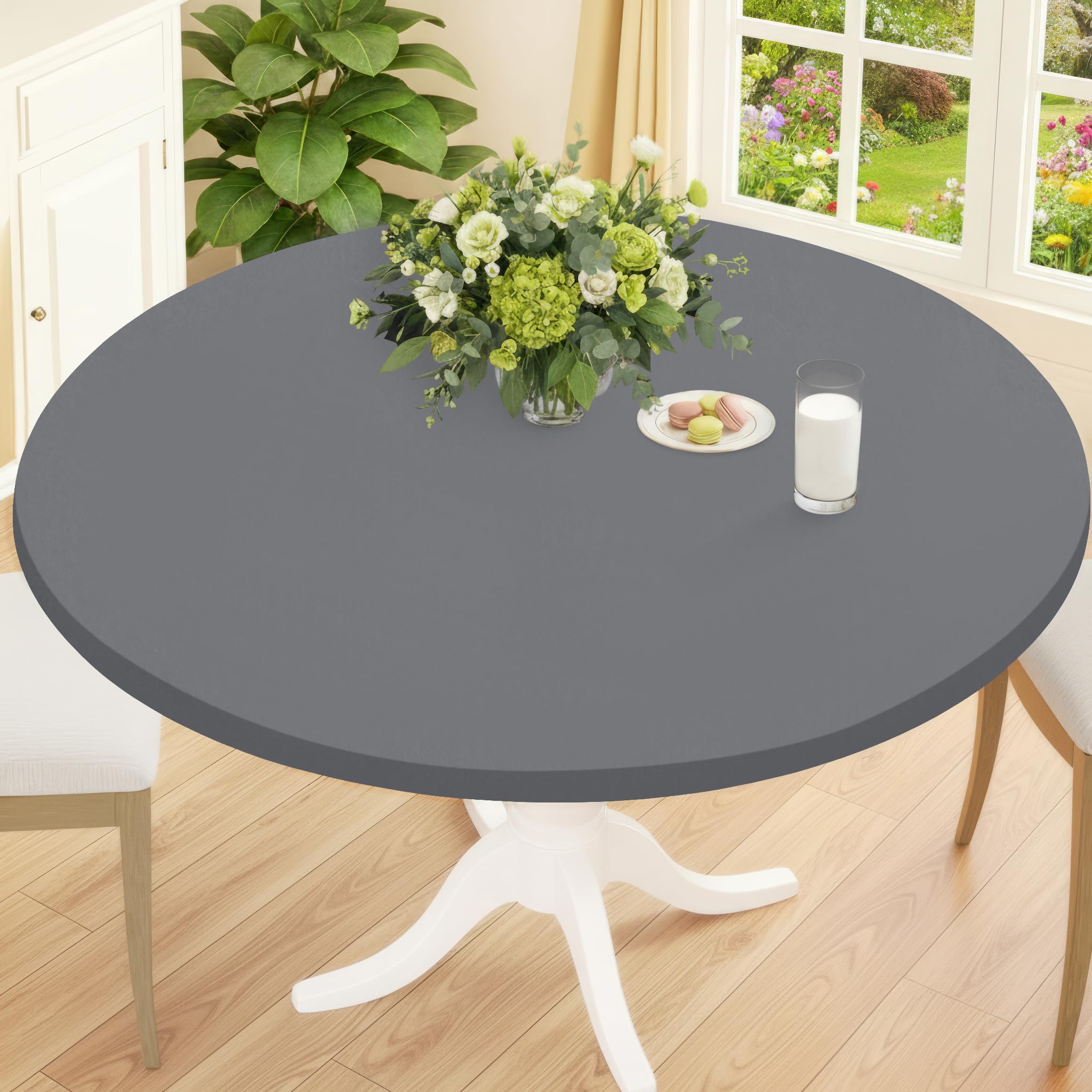 Smiry round spandex tablecloth with elastic fit for a secure, seamless table setup.