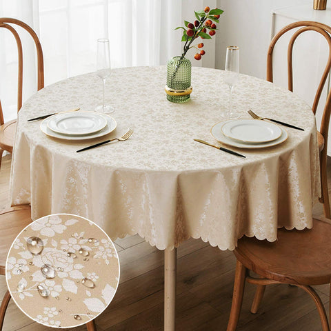 Smiry beige round table cloth sits on a table, waterproof and durable for daily dining.