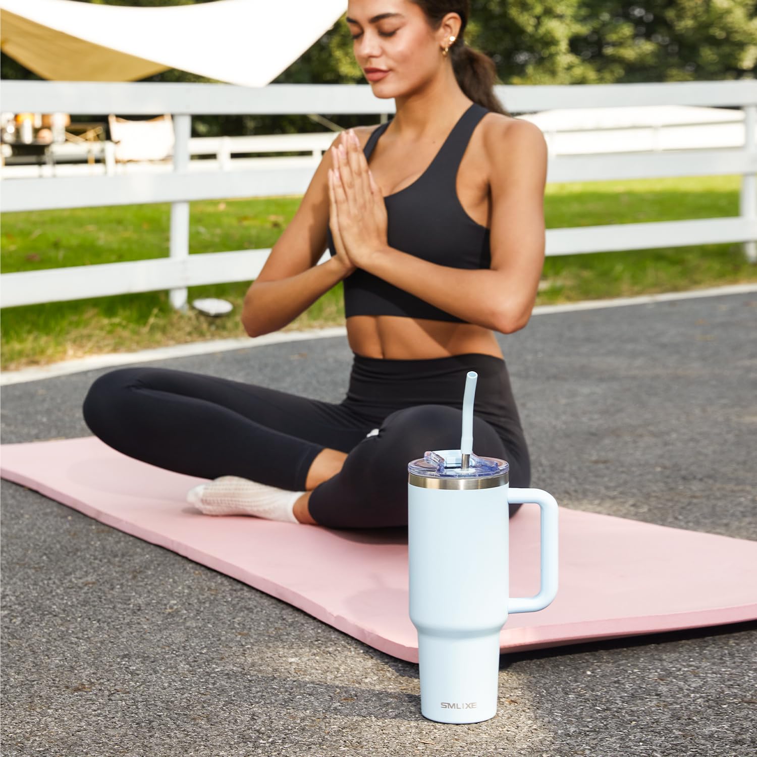 SMLIXE blue tumbler in use during travel and errands