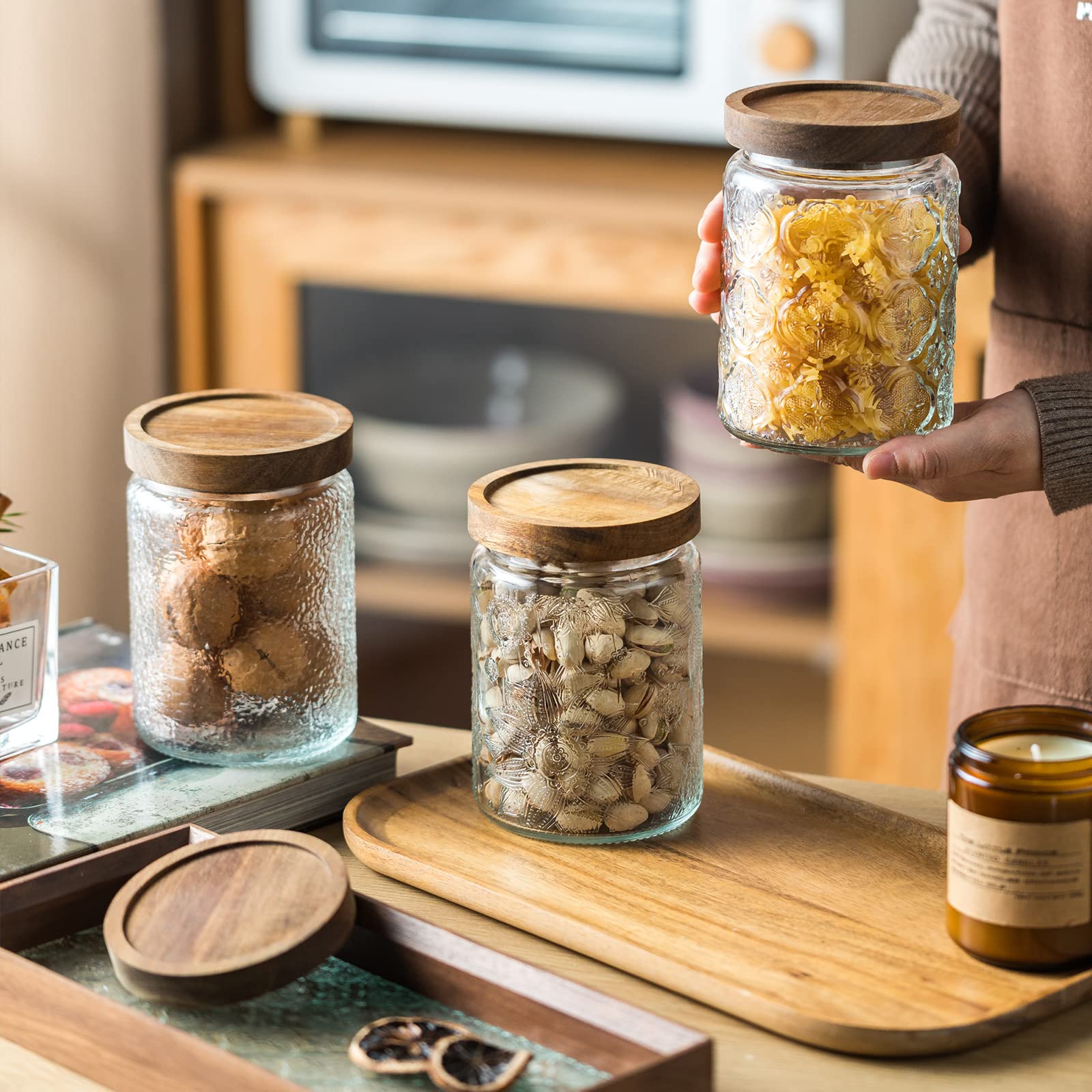 Snminetal jar with acacia lid for airtight freshness and vintage style.