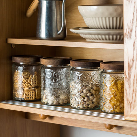 Snminetal glass jar ideal for coffee beans with wide mouth access.