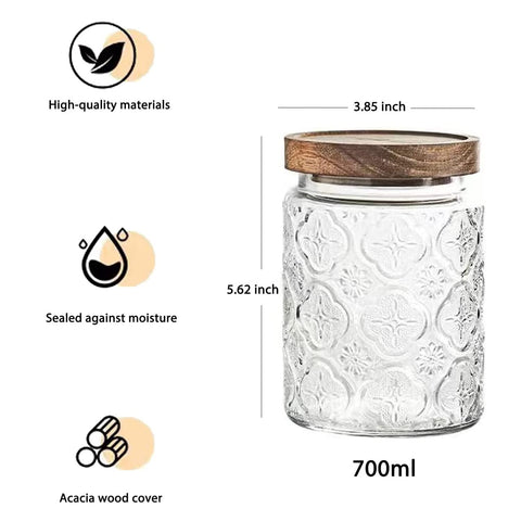 Snminetal plum-pattern jar close-up showing crystal-clear glass texture.