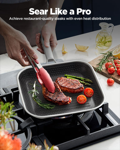 SNOWCLAD even-heat grill pan delivering consistent searing across the surface.