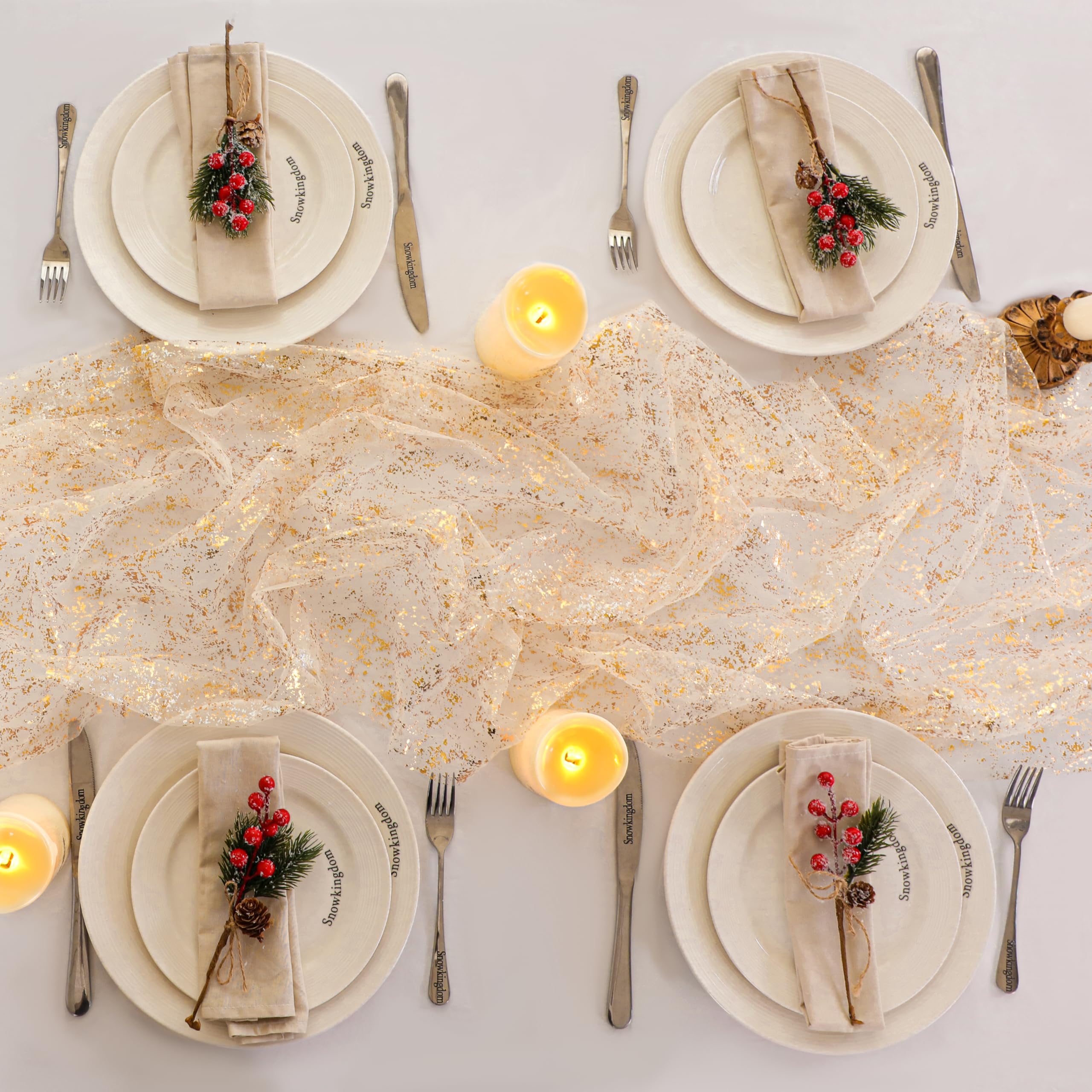 Snowkingdom gold sheer fabric with metallic accents for table styling.