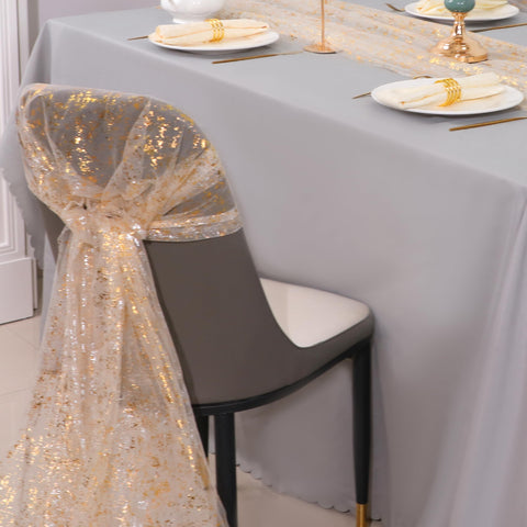 Indoor/outdoor event setup featuring Snowkingdom gold table runners