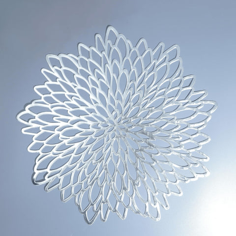 Snowkingdom placemats with silver leaf design add festive table flair
