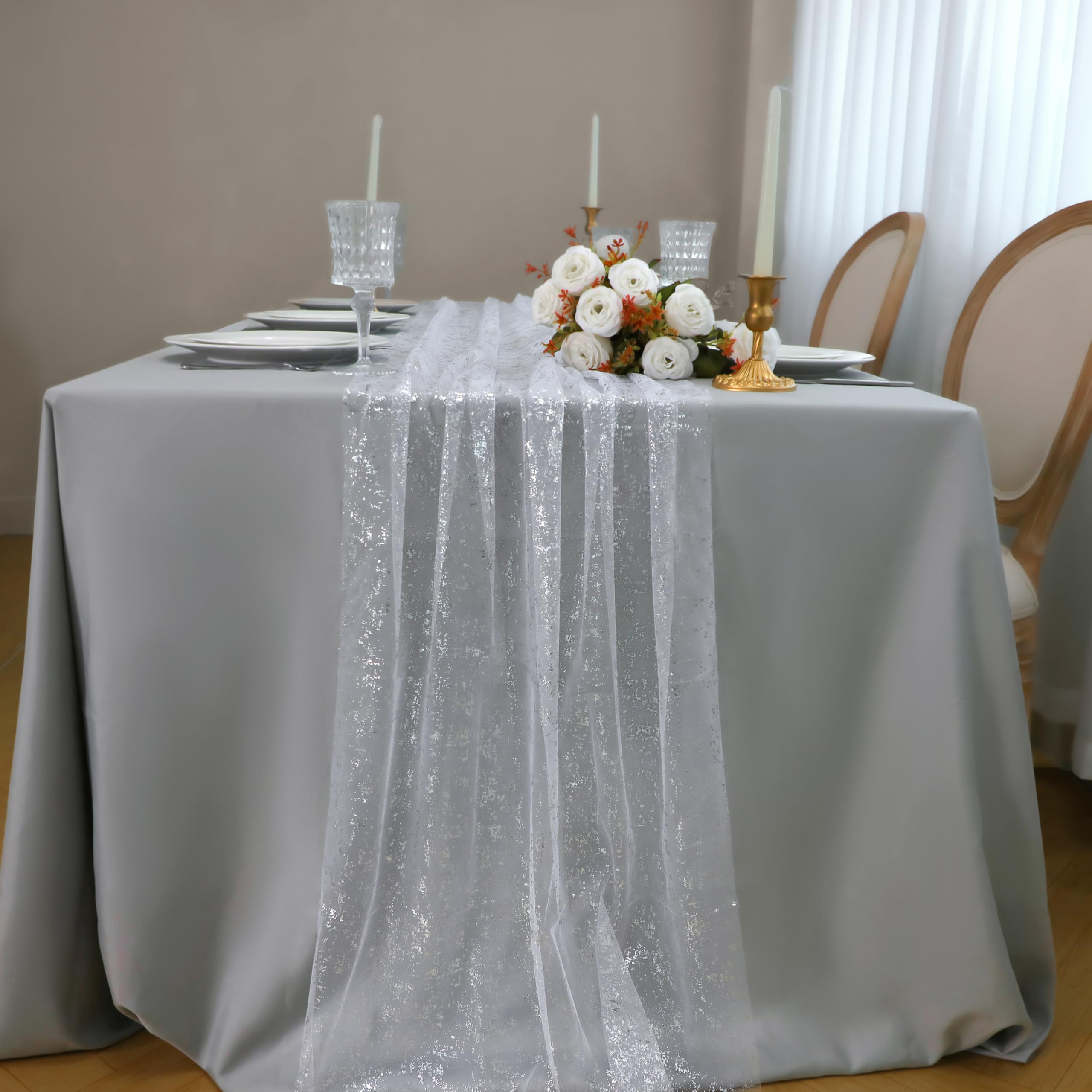 Snowkingdom sequin silver table runner brightens weddings and receptions with reflective shimmer.