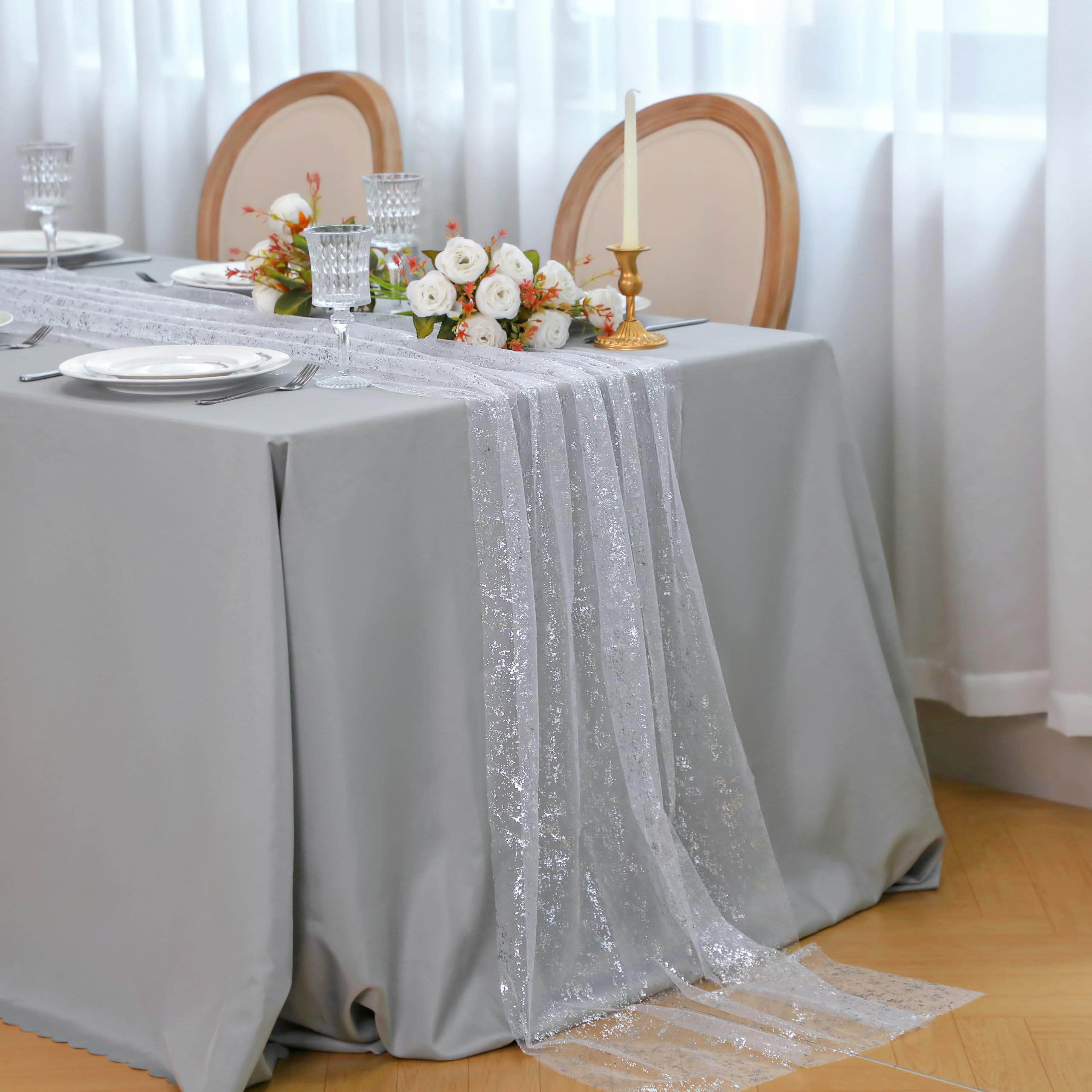 Snowkingdom table drape over arches and edges for romantic backdrops.