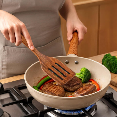 Snuvid teak wood salad fork perfect for serving fresh greens.