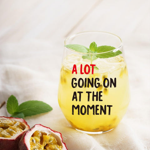 SOCOARZR Swifti wine glass held in hand during a casual toast.