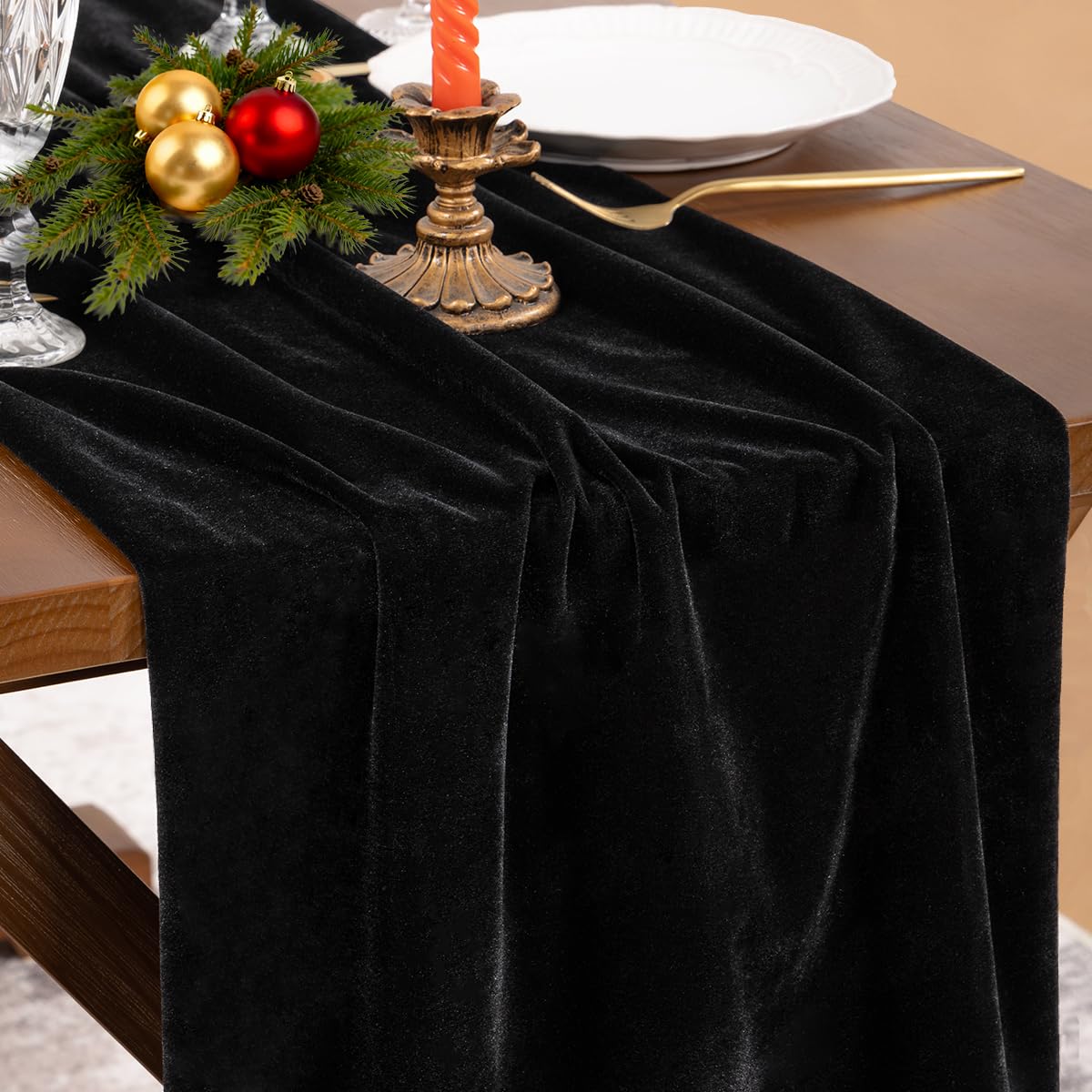 Socomi black velvet table runner on a dining setup for a luxurious look.