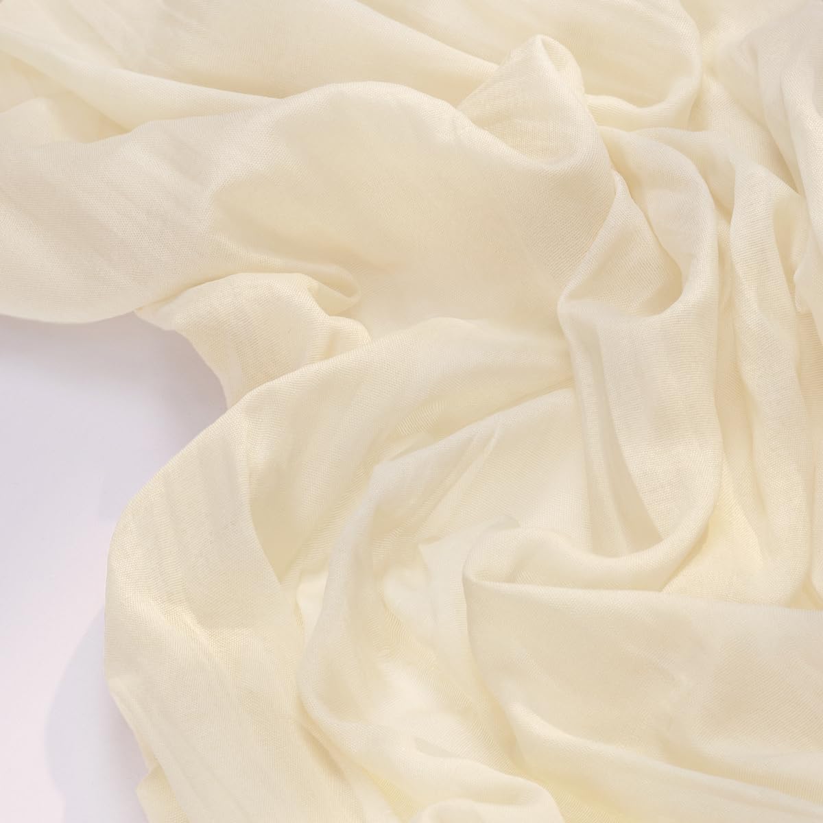 Socomi beige cheesecloth runner on a wedding arch drape adds boho romance