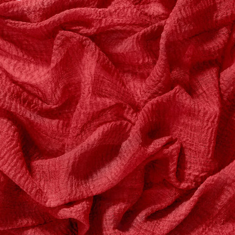 Socomi durable hand-dyed cheesecloth runner withstands seasonal events with graceful wrinkles.