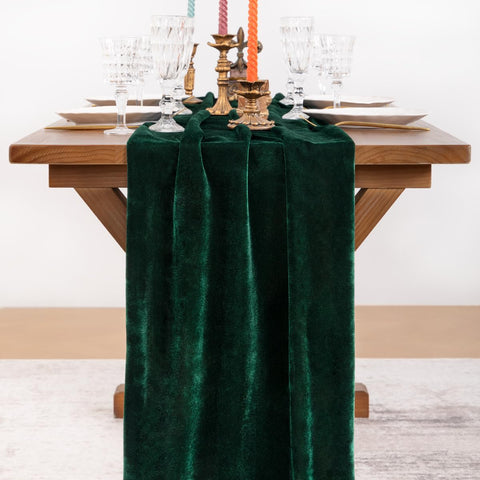 Socomi emerald velvet texture close-up highlights soft, luxurious drape.