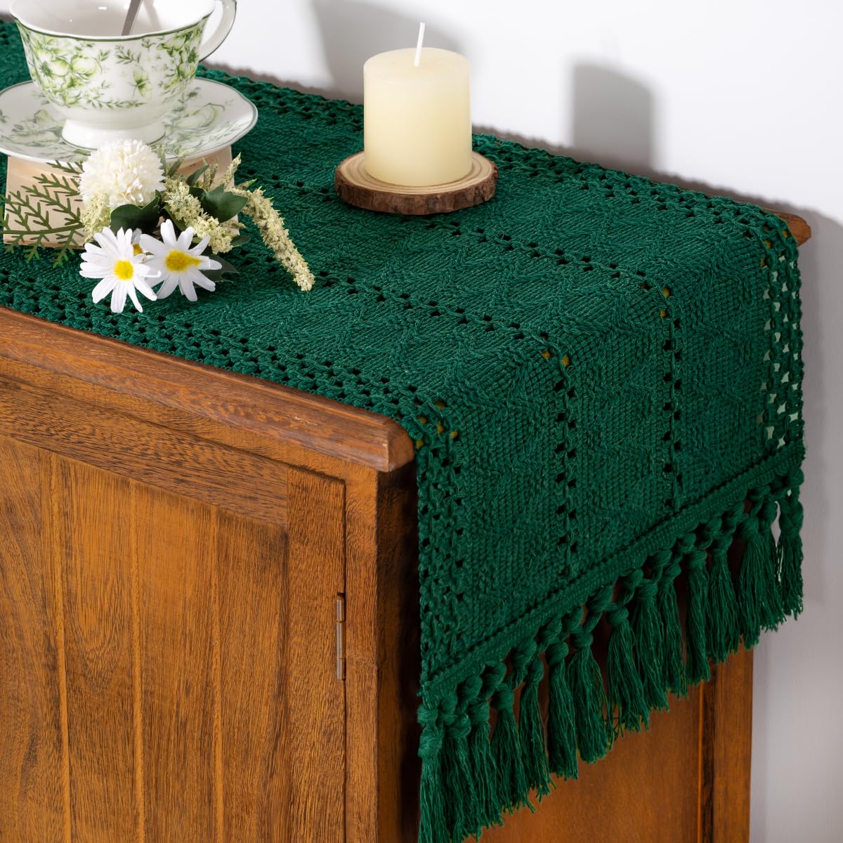 Socomi macrame fringed edges add textured charm to a farmhouse dining table.