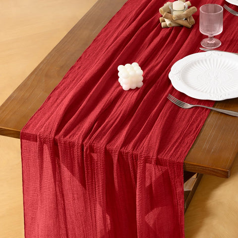 Socomi red cheesecloth table runner, 120in, perfect for elegant wedding centerpieces.