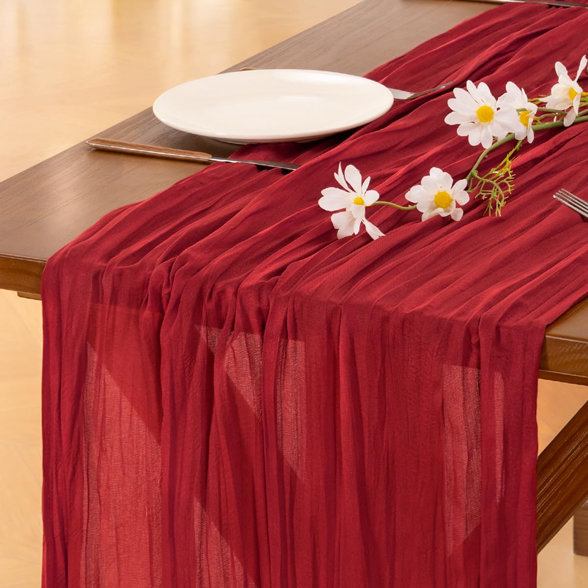 Socomi red cheesecloth table runner close-up showing soft rustic texture for weddings
