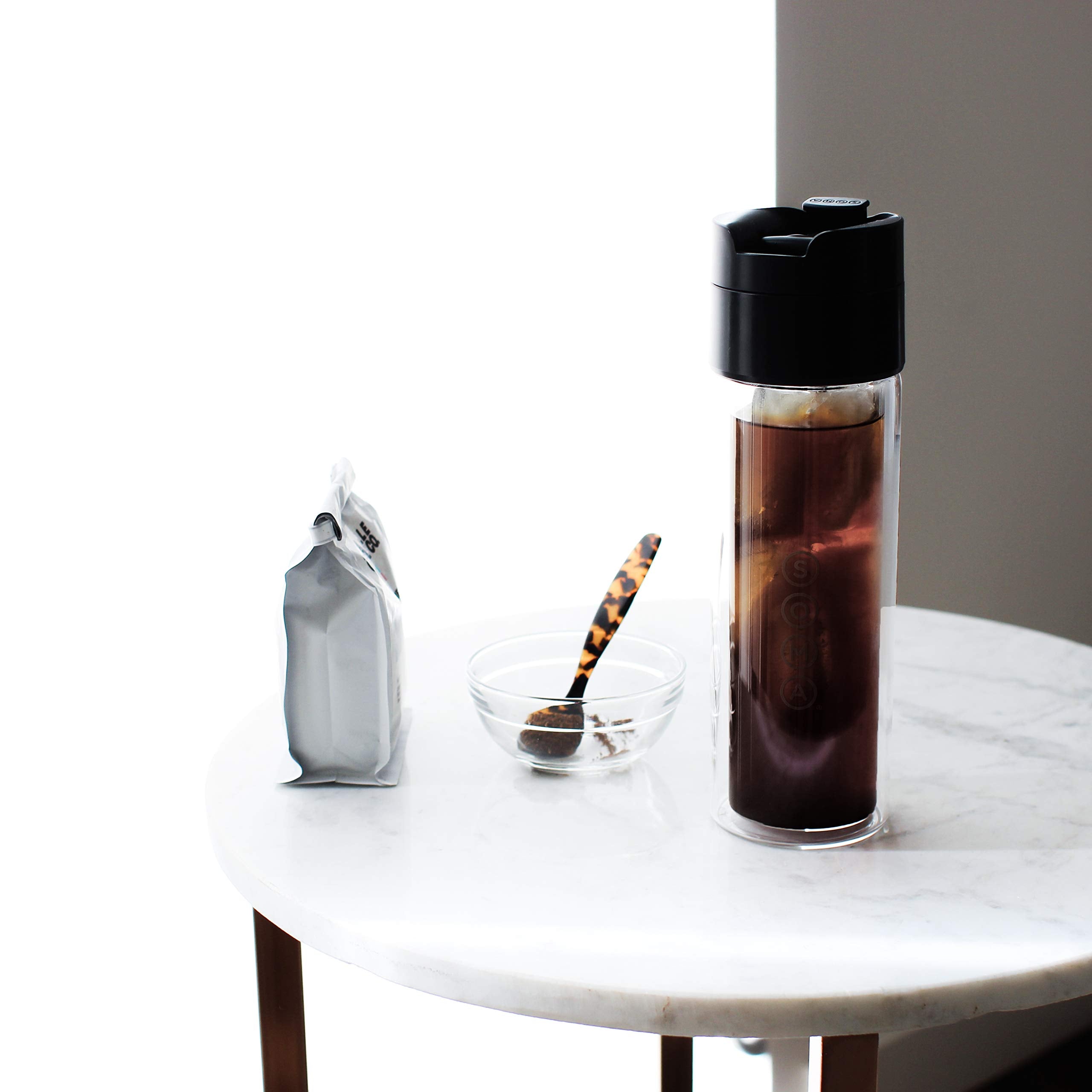 Soma bottle tea infusion view emphasizes clean, sediment-free brewing.