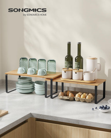 SONGMICS cabinet organizer stackable setup, maximizes cabinet space.