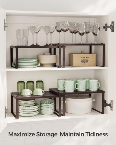 SONGMICS Spice Racks in cabinet storage arrangement showing organized shelves.