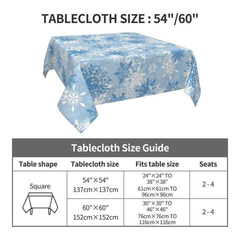 Sorktse blue snowflake decor enhances holiday table setting.