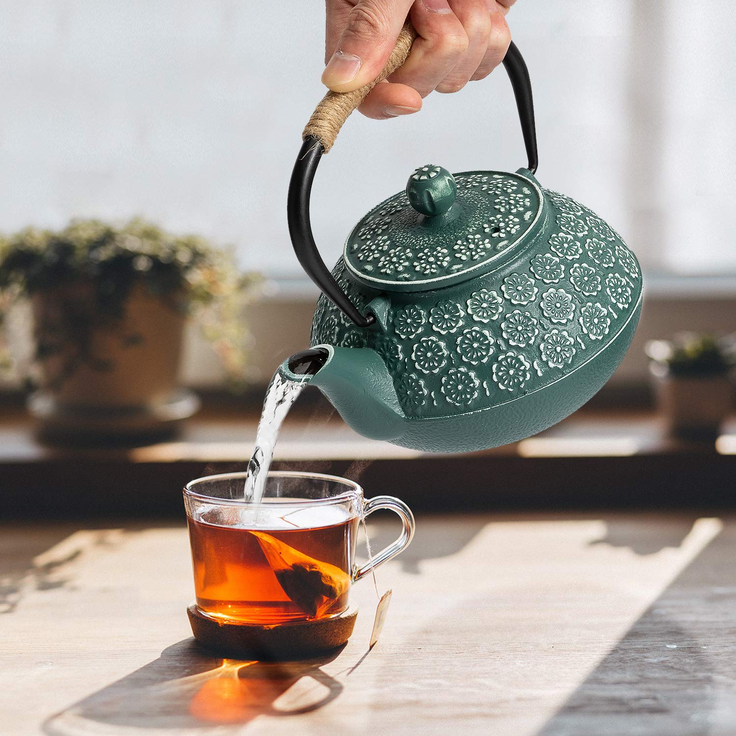Sotya cast iron teapot stainless steel infuser included for clean brews.