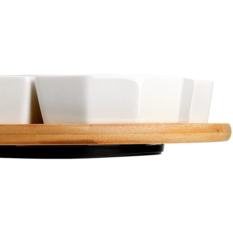SOUJOY central porcelain bowl holds dips neatly as a centerpiece.