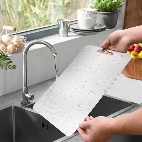 Southaabo titanium cutting board dishwasher-safe; easy cleaning with non-porous, stain-resistant surface.