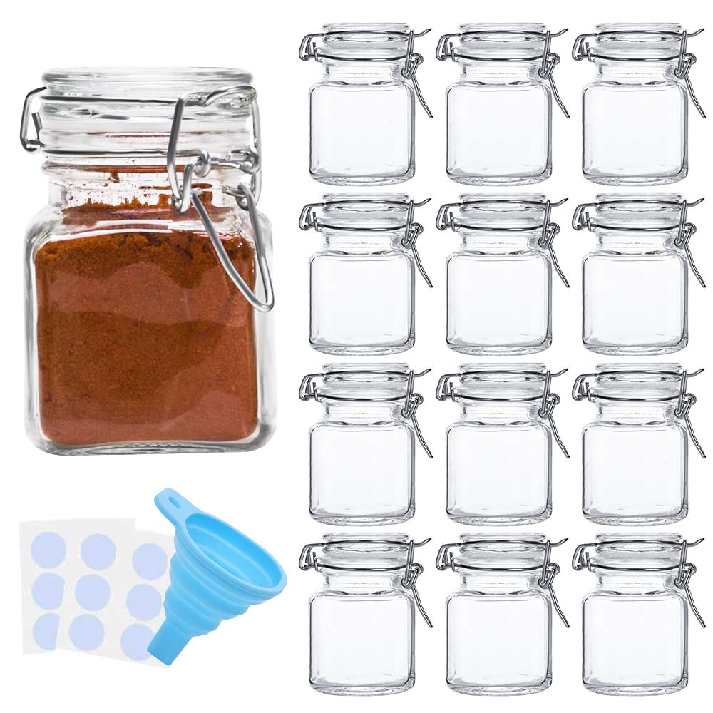 SPANLA spice jars close-up showing sturdy 4oz glass bottles for organized storage.