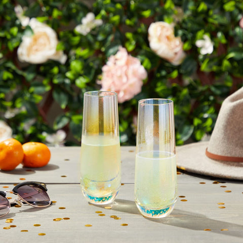 Sparkle and Bash holographic glass flute catches light during festive toasts.