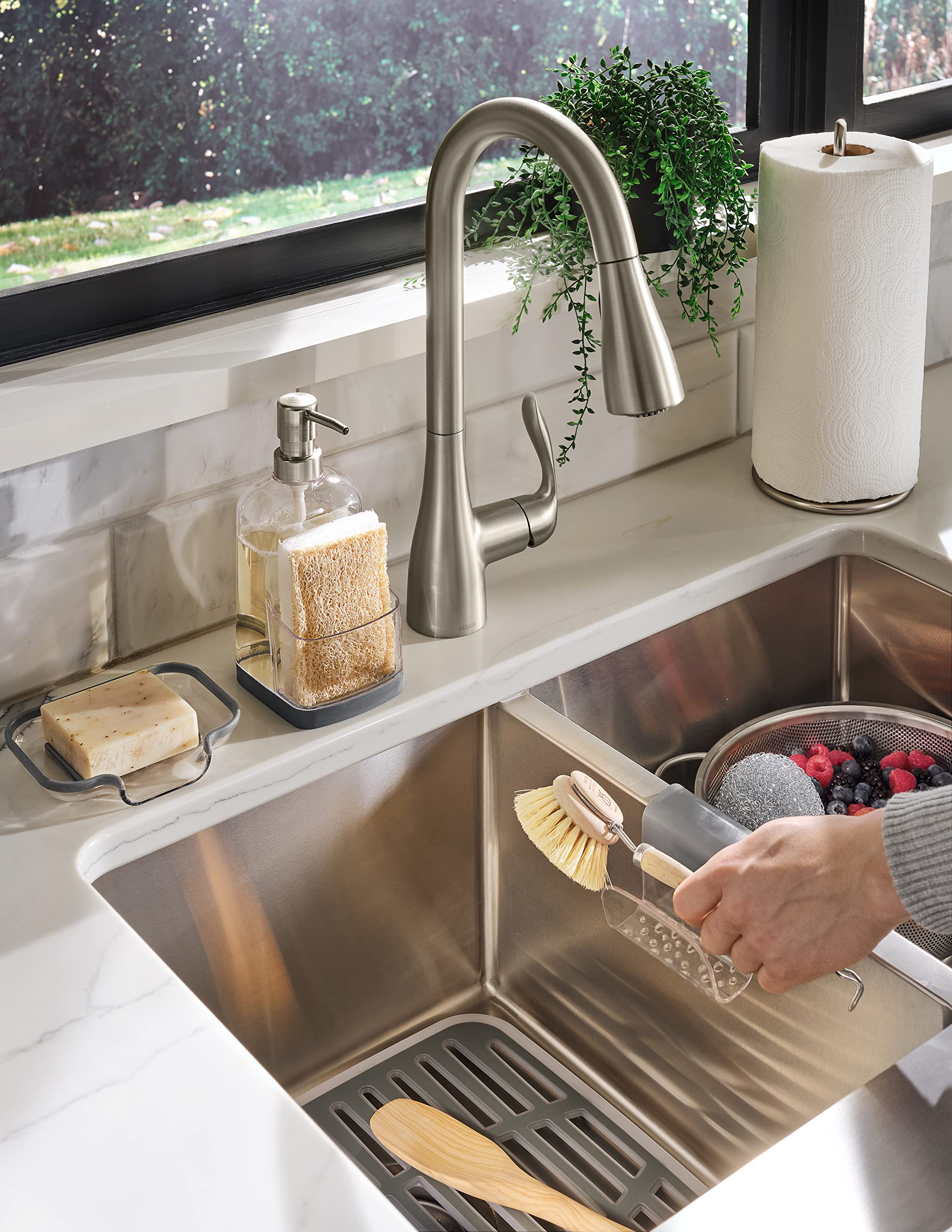 Spectrum Cora sink mat measures 12.75in L x 11.25in W for compact spaces