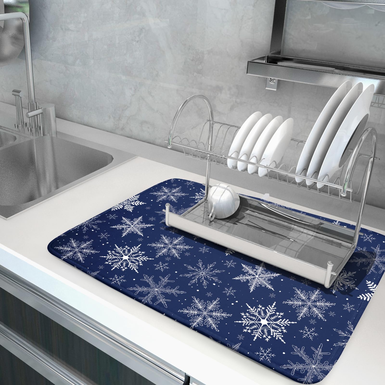 Sphragiyn winter-blue pattern mat protects counters from spills.