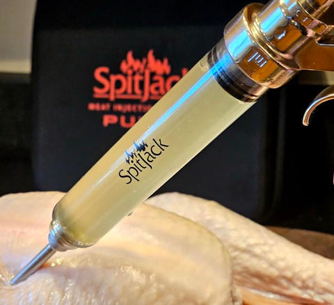 SpitJack PULSE ergonomic squeeze-handle focused on comfort during use.