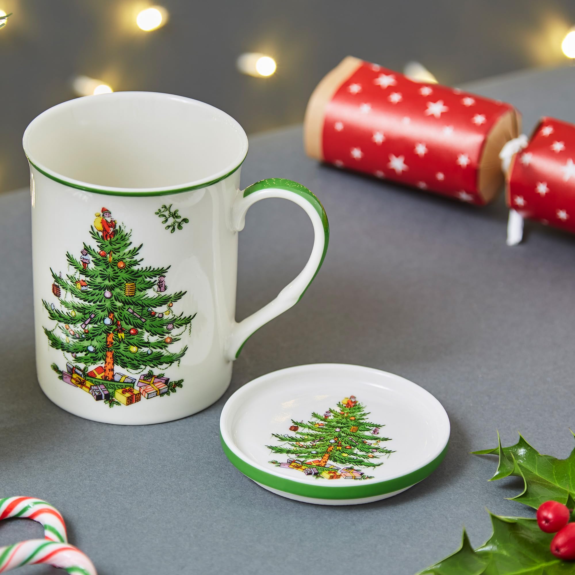 Spode Christmas Tree coaster protects surfaces during holiday beverages.