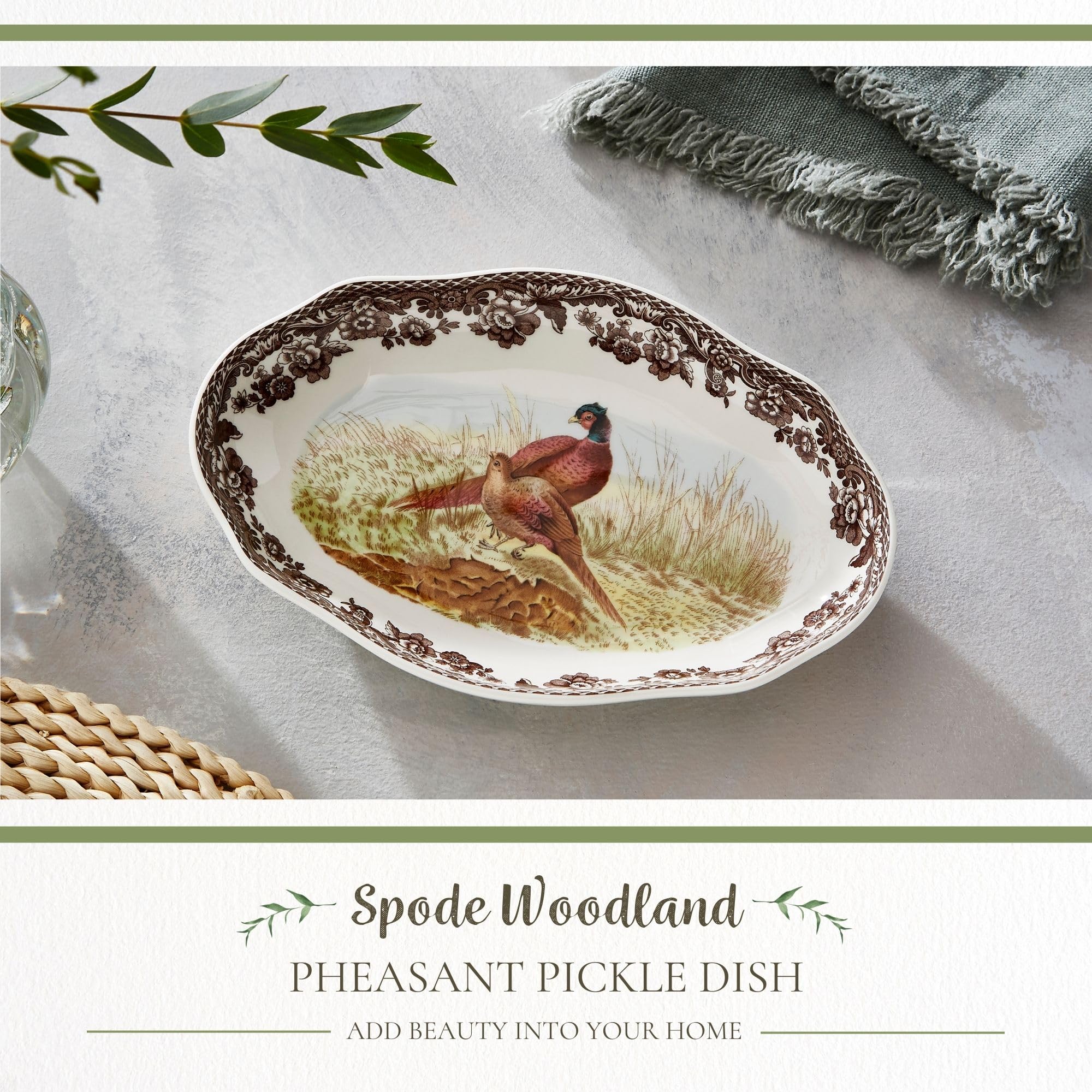 Spode Woodland border close-up on the pheasant motif enhances holiday table styling.