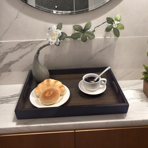 Spriieny tray raised edges help prevent spills during service.