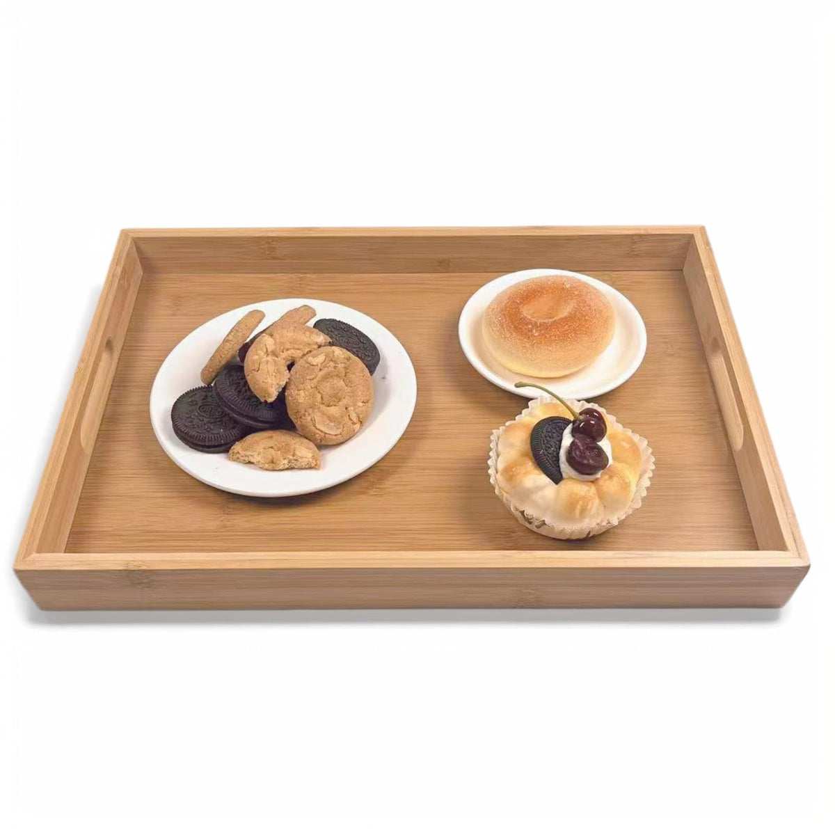 Sprieny bamboo tray with rectangular handle for easy serving.