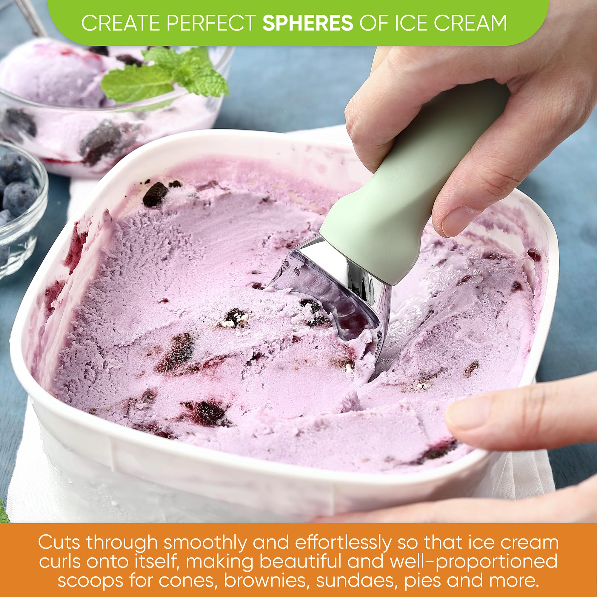 Spring Chef ice cream scoop pink handle with lid-notch for lifting lids.