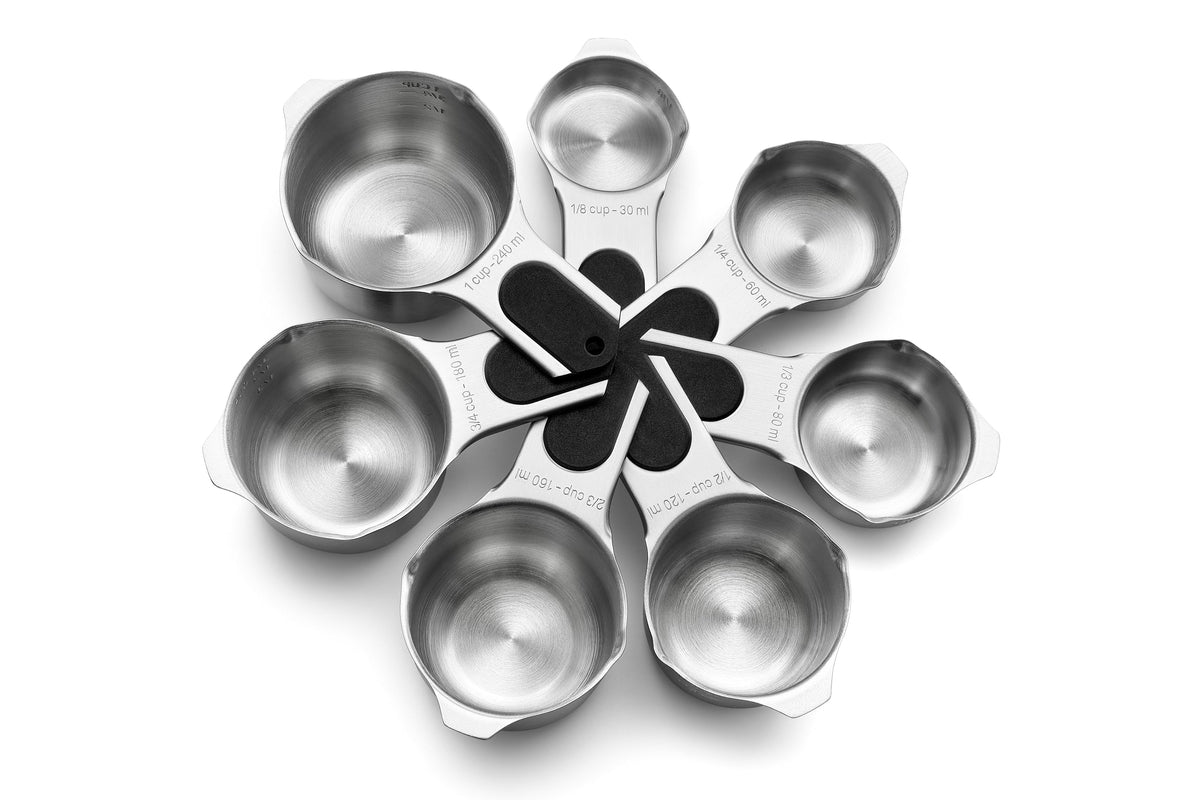 Spring Chef magnetic measuring cups nest for compact storage.