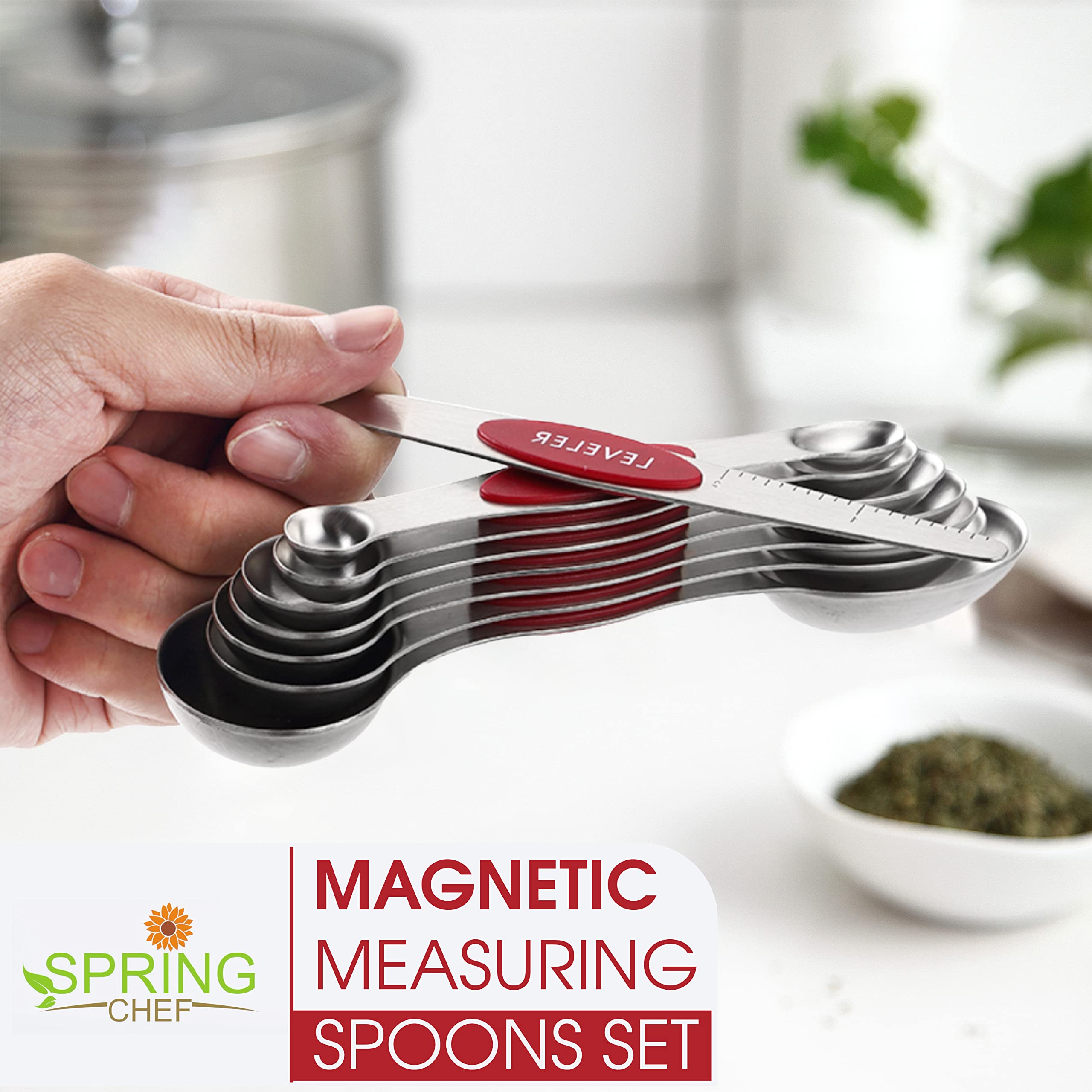 Spring Chef red oval-end spoon fits spice jars for tidy scooping.
