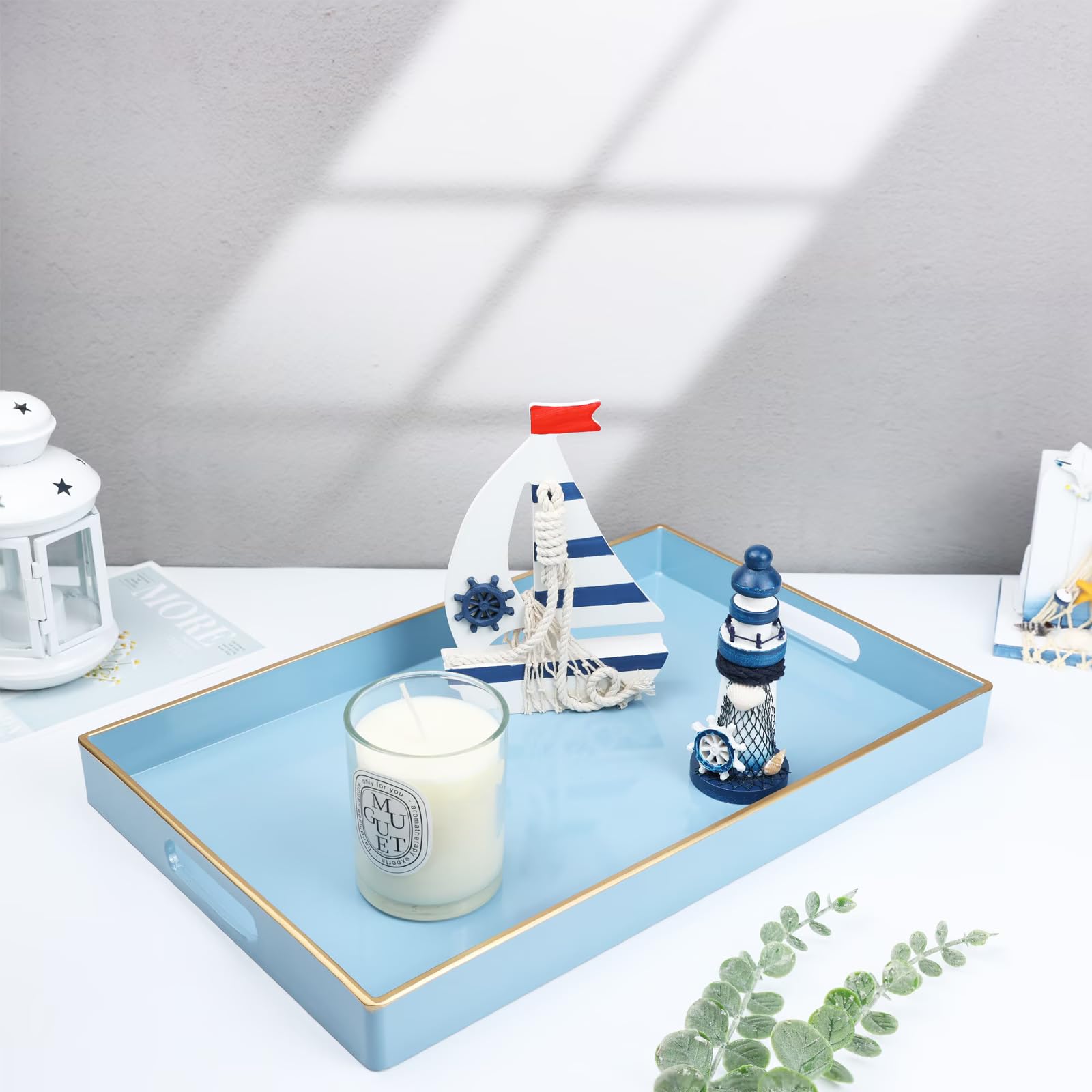 Spsyrine blue tray with glossy finish adds chic decor to living rooms.