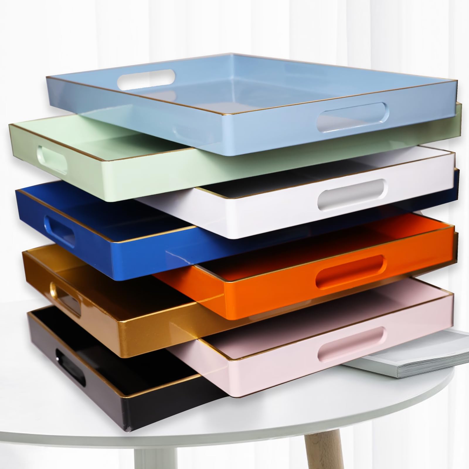 Spsyrine blue tray organizing keys and remotes at home.