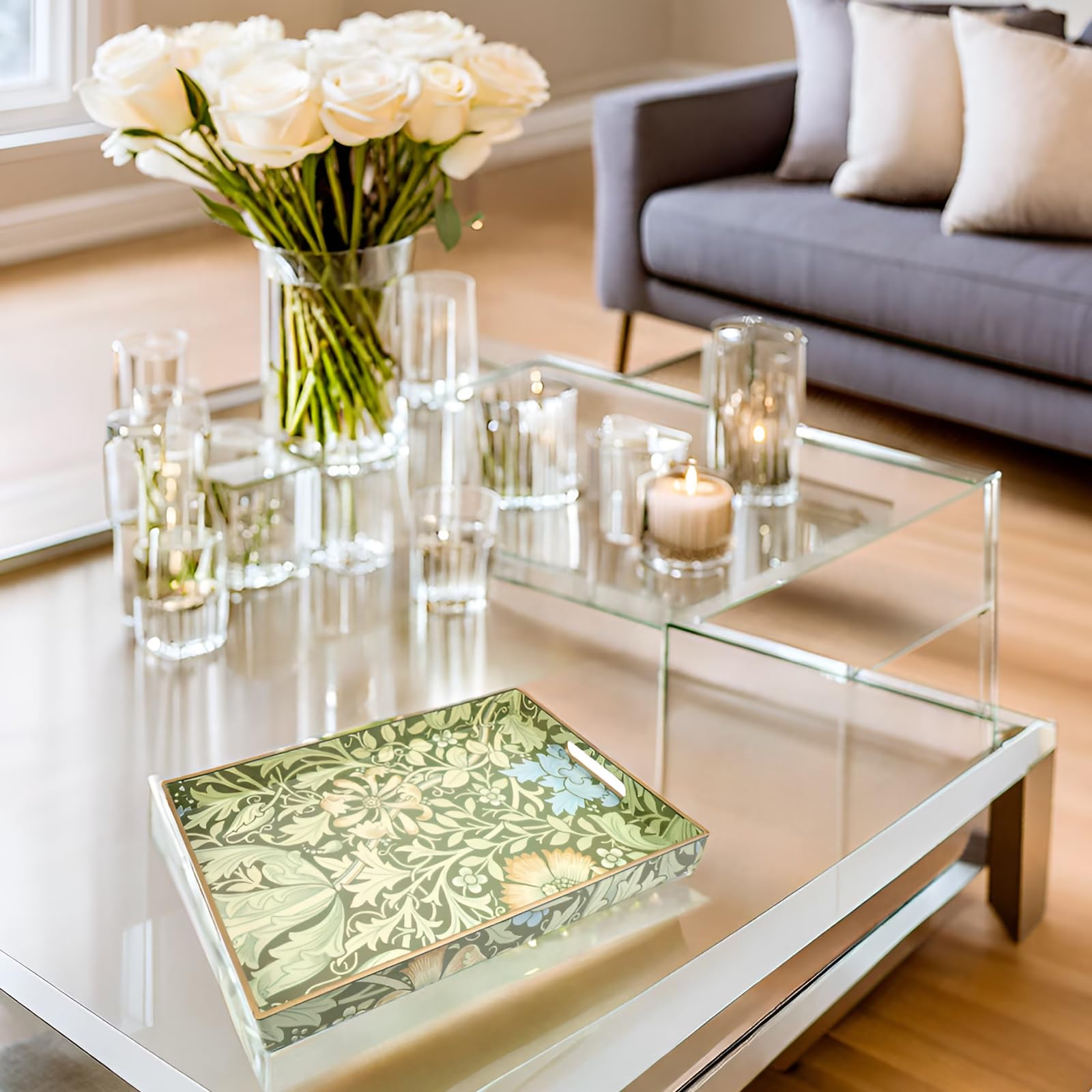 Spsyrine rectangle design tray on a coffee table adds a tidy focal point.