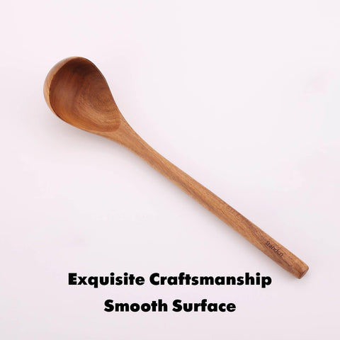 Standcn Acacia Wood Utensils Set on a kitchen counter.