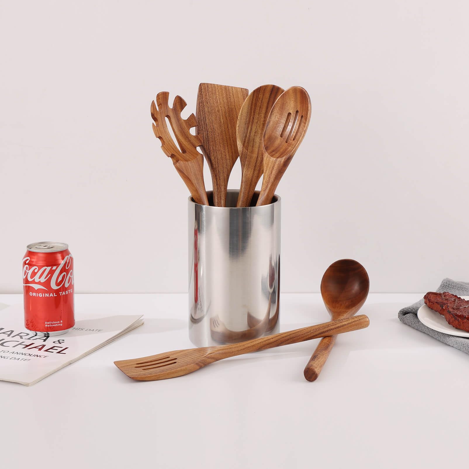 Standcn Acacia Wood Slotted Serving Spoon drains while serving.