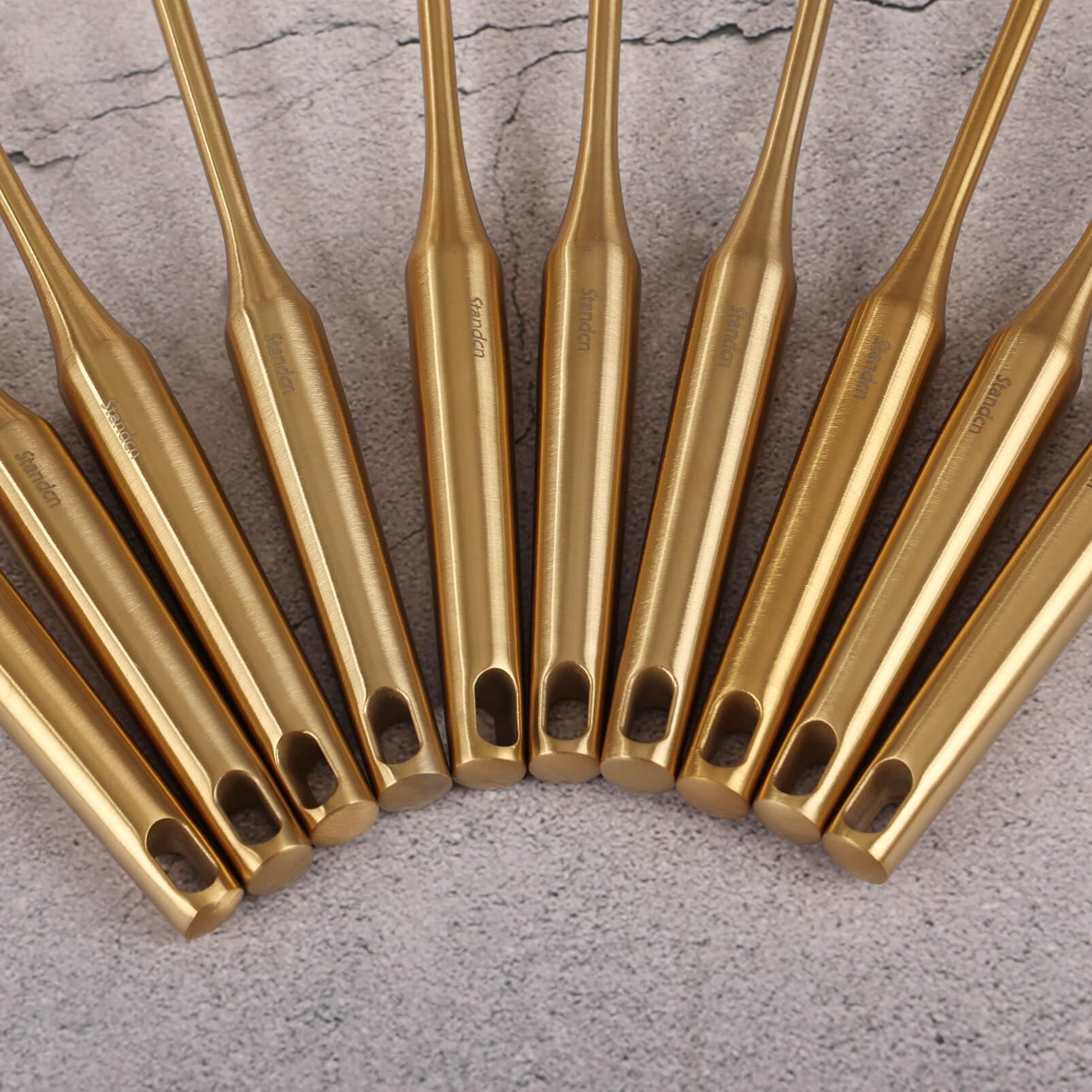 Standcn gold ladle ideal for soups and sauces with durable one-piece construction